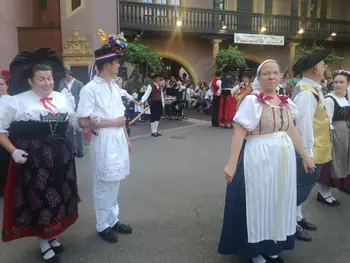 Folklore dancing in the evening at Colmar, Alsace (France)